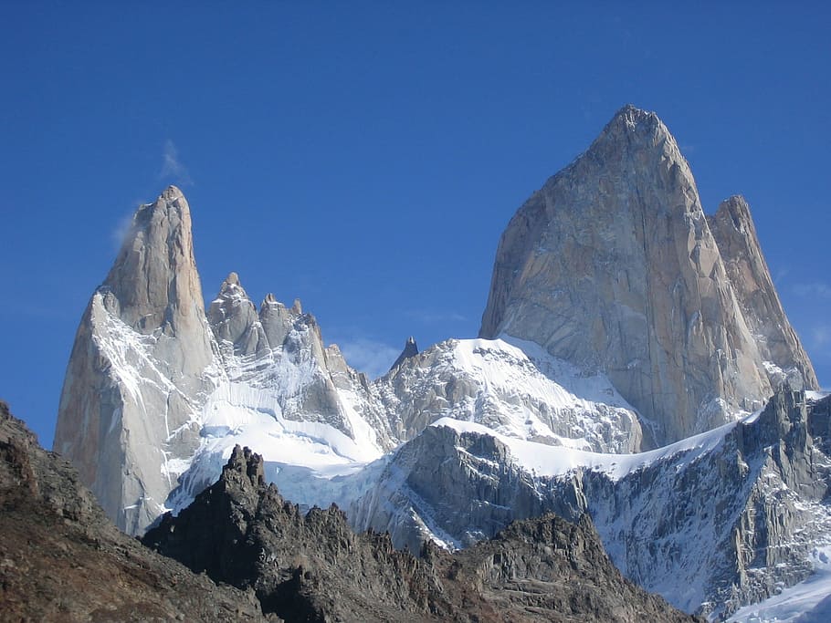 mountain covered with snow under blue sky, fitz roy, cerro torre
