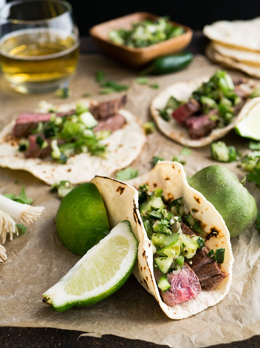 taco with beside sliced lemon, green and brown taco on brown surface HD wallpaper