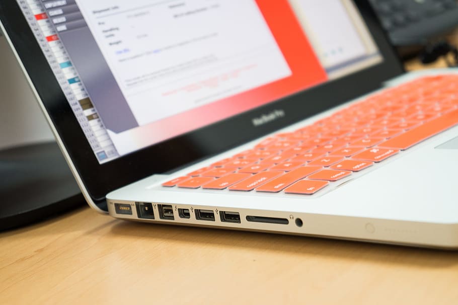 MacBook Pro turned on, computer, desk, office, table, work HD wallpaper
