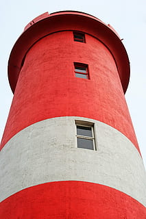 lighthouse, nautical, beacon, red, white, tall, warning, clouds HD wallpaper