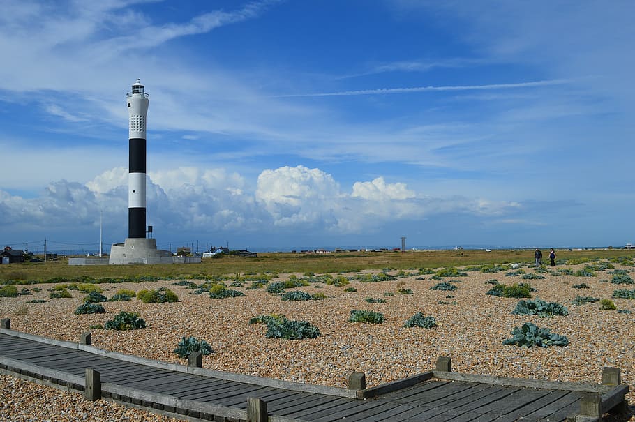 lighthouse, sky, beach, beacon, nautical, shore, landmark, coast HD wallpaper