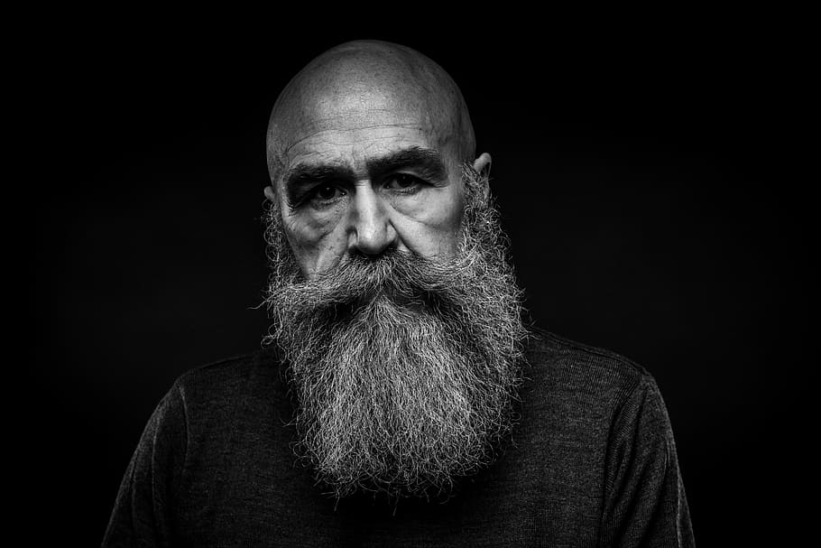 Enigma, grayscale photo of man with beard, studio, black and white