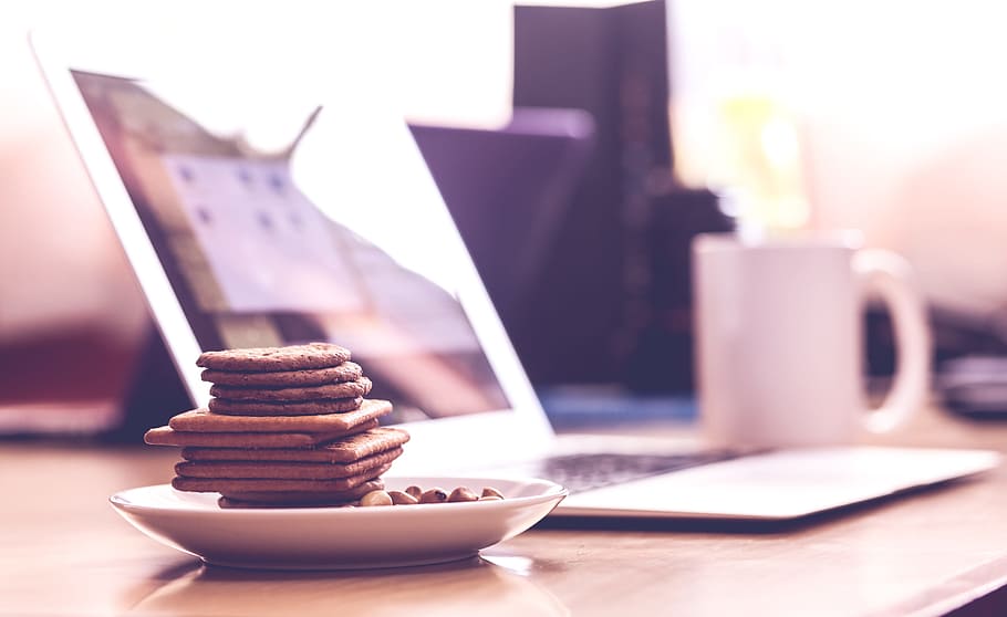 brown biscuit in saucer, office, work, desk, table, laptop HD wallpaper