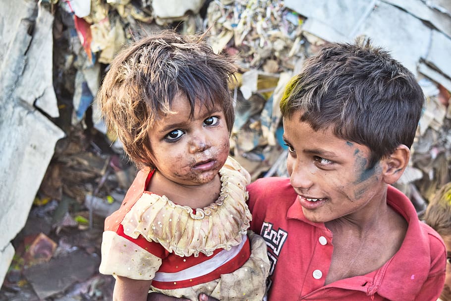 boy carrying a girl, sister, brother, poor, slums, india, child