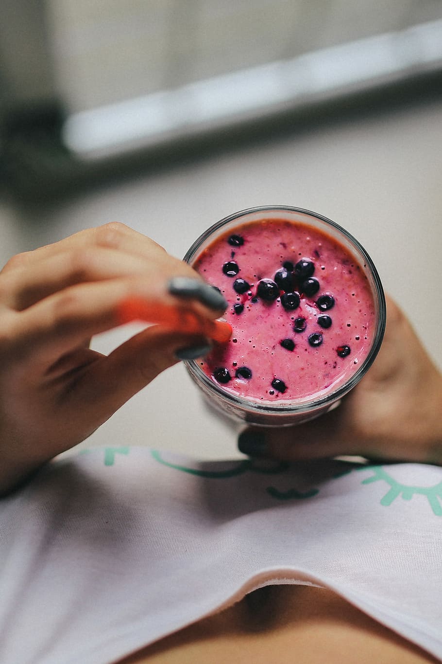 Girl holding blueberry yoghurt, fruits, breakfast, morning, healthy