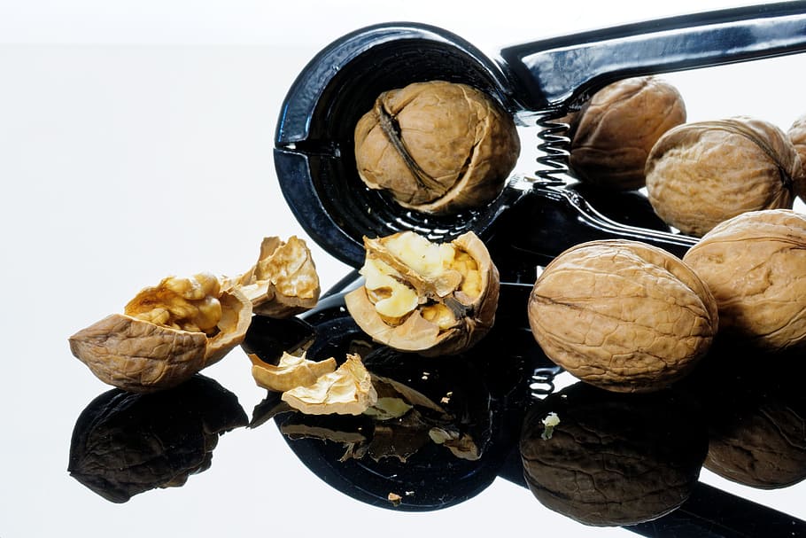 walnuts cracked using nutcracker, nutshells, christmas time HD wallpaper