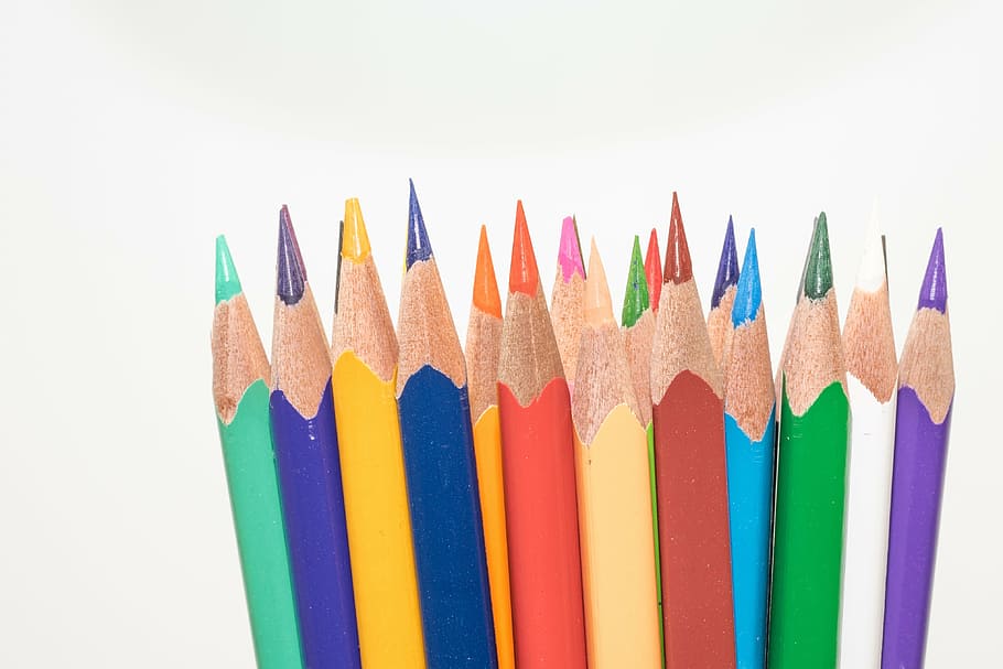 assorted-color pencil lot, colored pencils, wooden pegs, pens