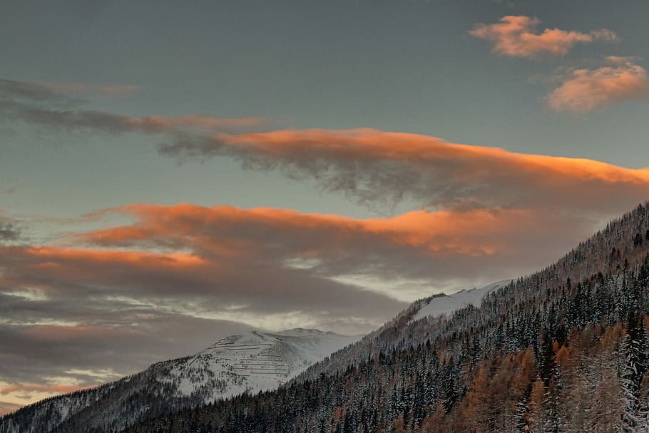 landscape photography of gray rock formation, photo of mountain under white sky at daytime HD wallpaper