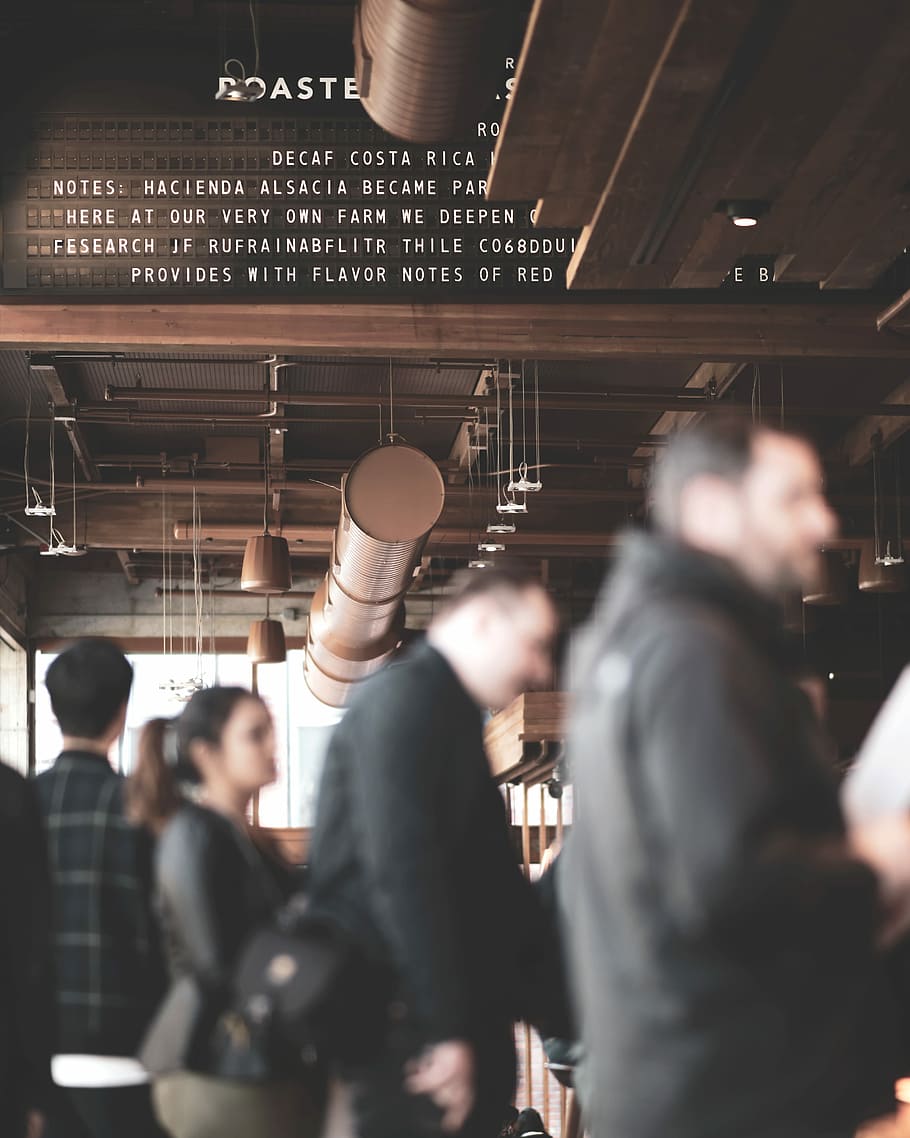 people inside coffee shop, people wearing black jackets standing inside room HD wallpaper
