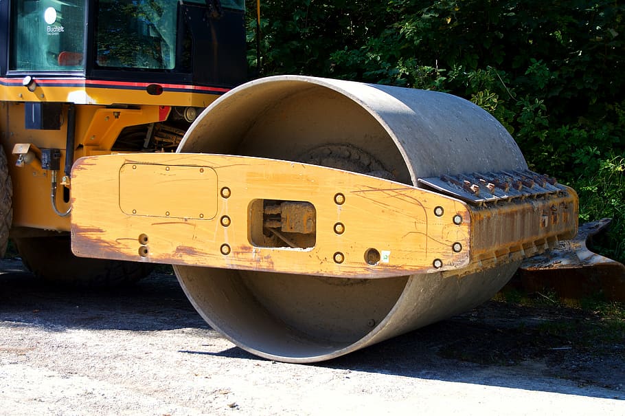 yellow and gray road roller near green bush, grader, asphalt roller HD wallpaper