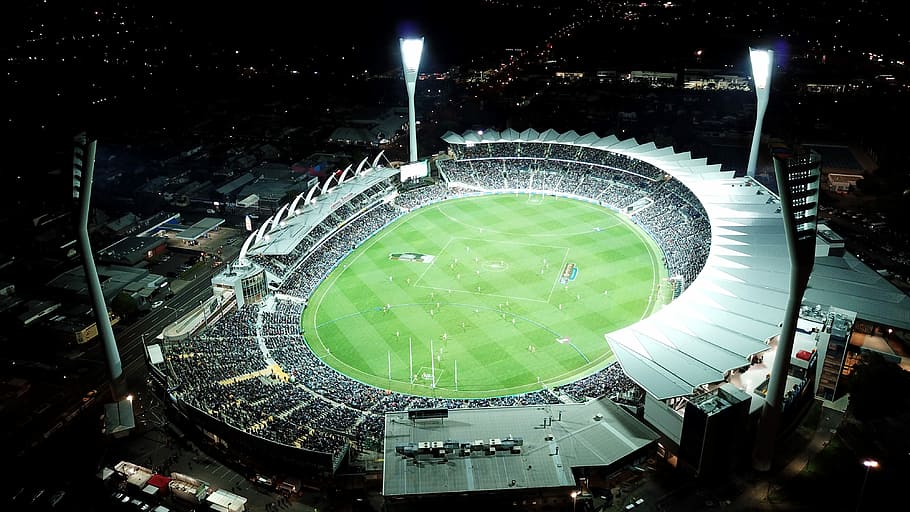high-angle photo of round stadium at nighttime, aerial photography of stadium HD wallpaper