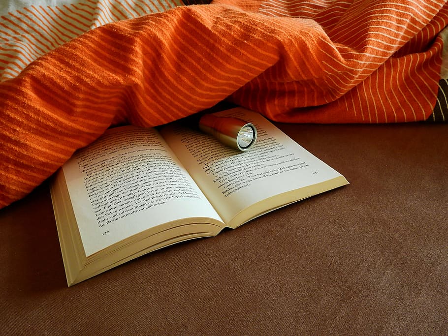 book under orange textile, read, literature, learn, font, page HD wallpaper
