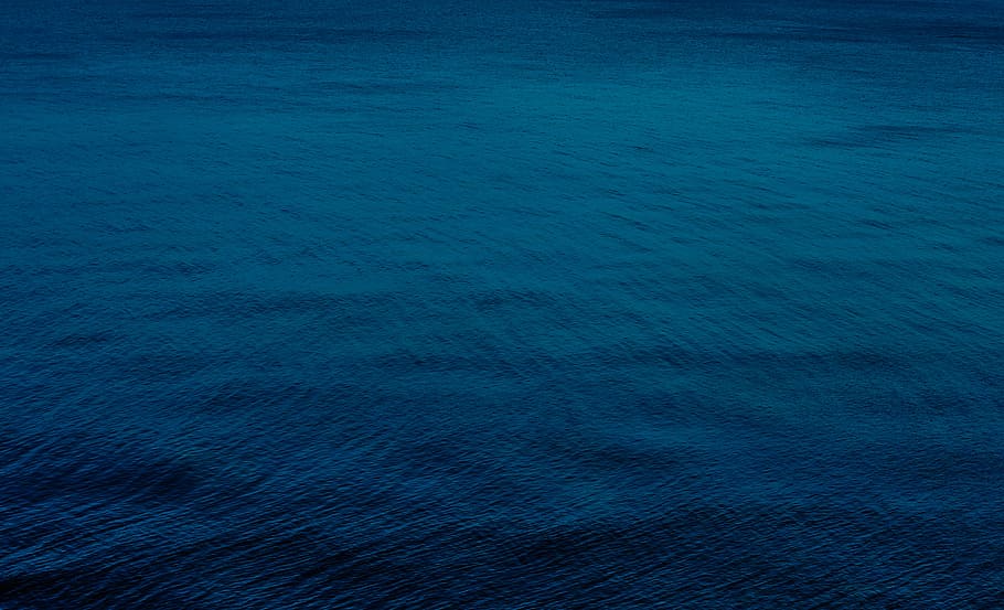 selective focus photography of blue water, aerial of calm ocean waters HD wallpaper