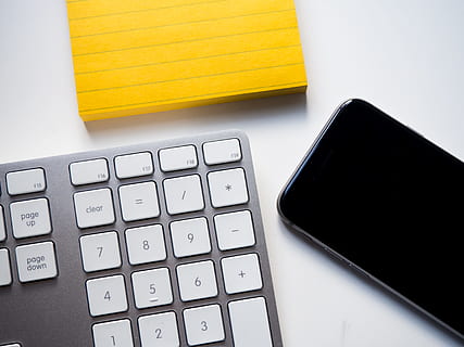 Keyboard, Phone, and Yellow Note on White Desk, computer, iphone HD wallpaper