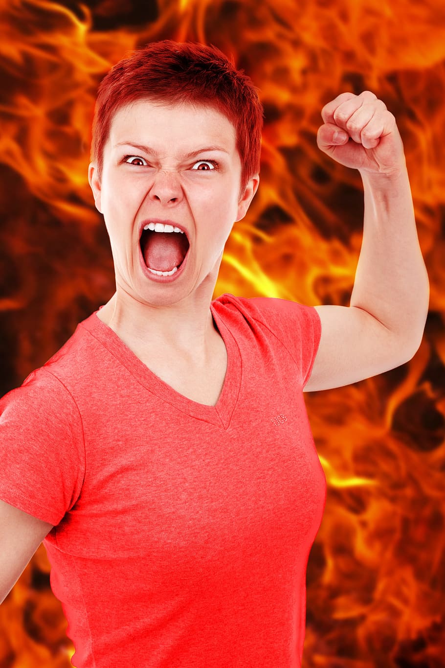 woman in red v-neck top with flame background, anger, angry, bad