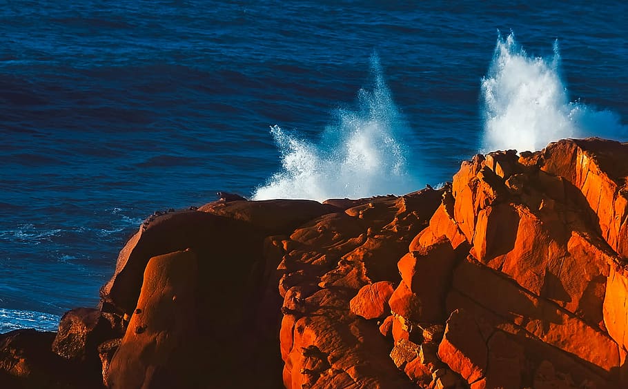 water splashing through brown cliff, sea, ocean, waves, rocks HD wallpaper