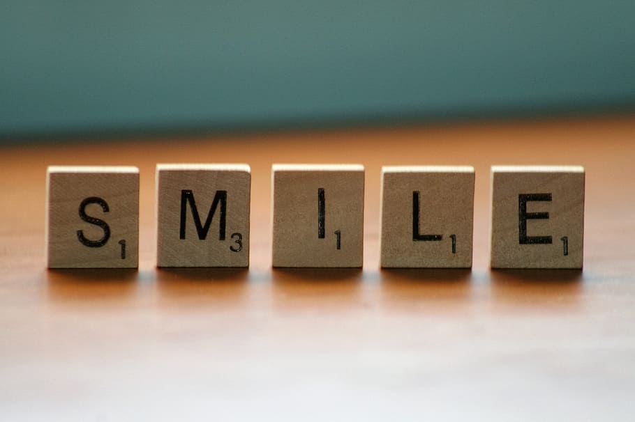 SMILE scribble tiles on top of brown wooden board, message, letters, HD wallpaper