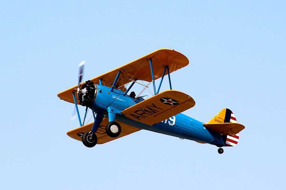 blue and yellow bi-plane on air, biplane, airplane, oldtimer
