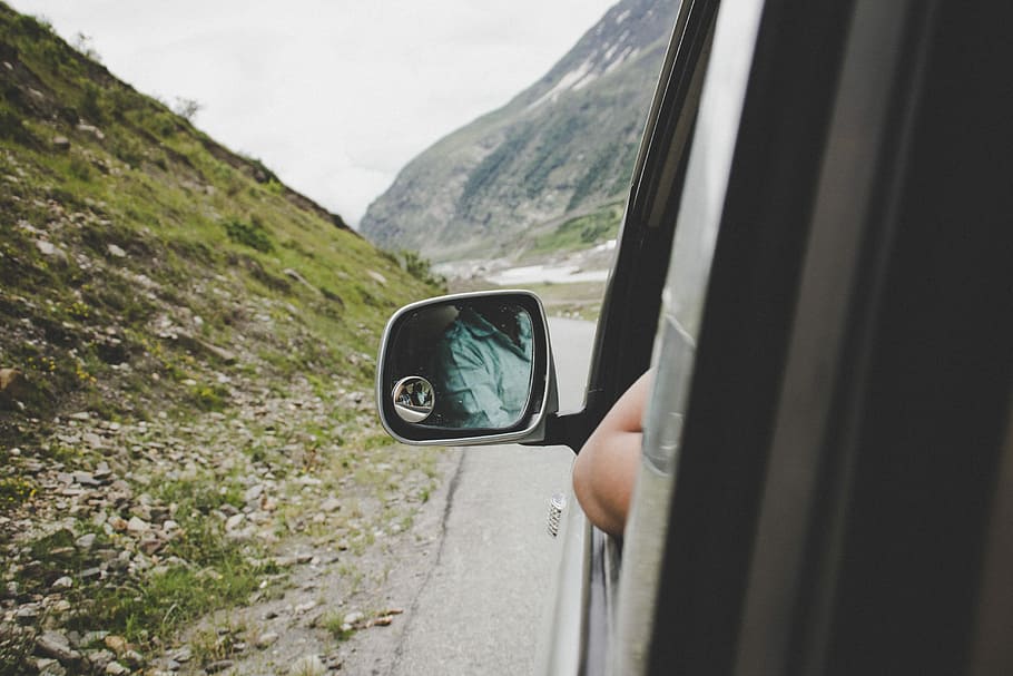 left side view mirror view at the back, gray vehicle beside mountain HD wallpaper