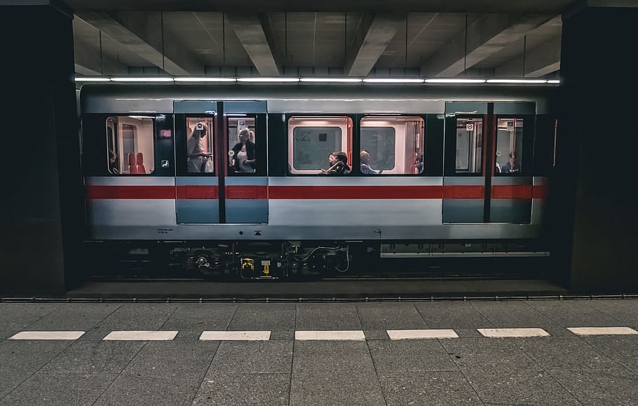 man sitting in train, prague, subway, metro, move, technology