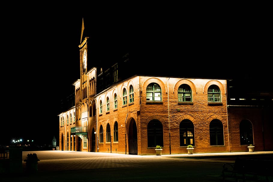 Brown Brick Building With Lights during Night Time, arched window HD wallpaper