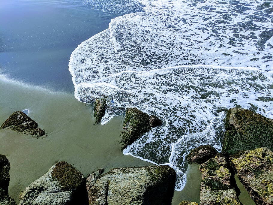 aerial photography of beach, sand, blue, rock, foam, water HD wallpaper