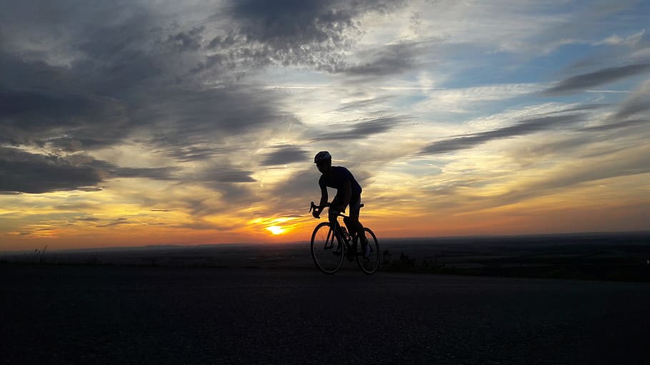 silhouette of man ride-on bicycle, sunset, bike, cycling, hill