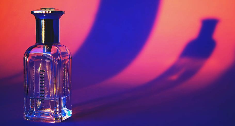 clear glass bottled fragrance, shadow, photography, perfume, cologne