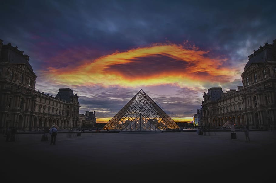 Louver Museum, France, concrete buildings on gray and orange sky HD wallpaper