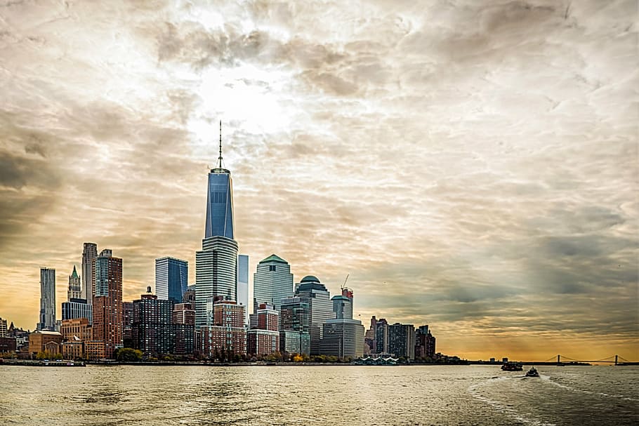Empire State Building, New York under crepuscular rays, cityscape HD wallpaper