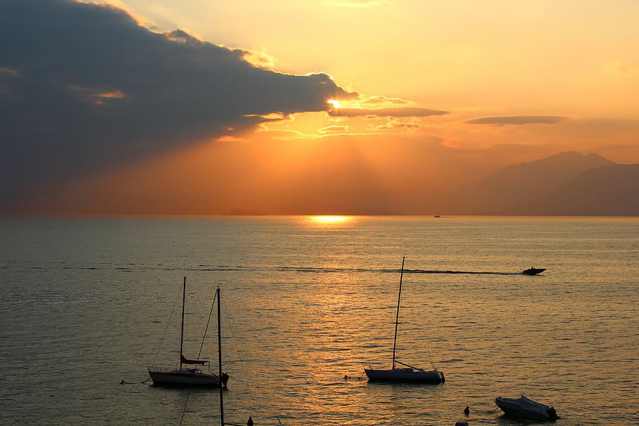 garda, sunset, clouds, sailing boats, powerboat, abendstimmung HD wallpaper