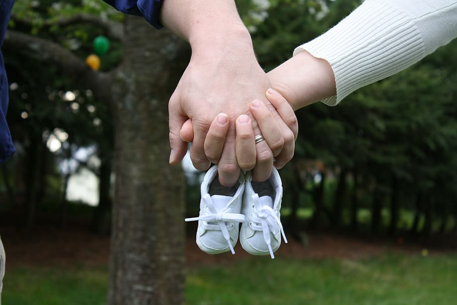 person holding pair of baby's white sneakers, announcement, shoes, HD wallpaper