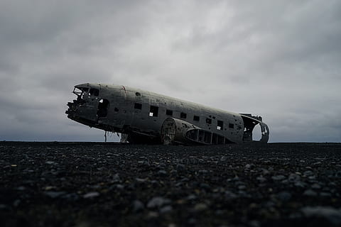 white plane on gray surface, abandoned plane on ground under white clouds HD wallpaper