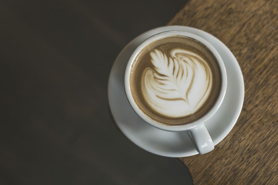 coffee latte serve in ceramic mug, cup of heart latte on top of brown surface, HD wallpaper