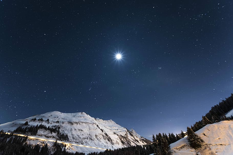 white mountain under starry night, big bright star during nighttime HD wallpaper