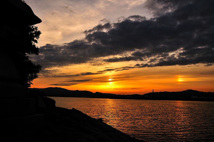 sun, two, sunset, sky, water, cloud - sky, beauty in nature HD wallpaper