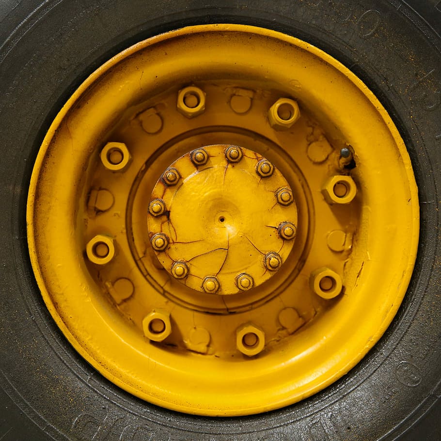 yellow multi-lug with linear at the center cap, tire, wheel, circle
