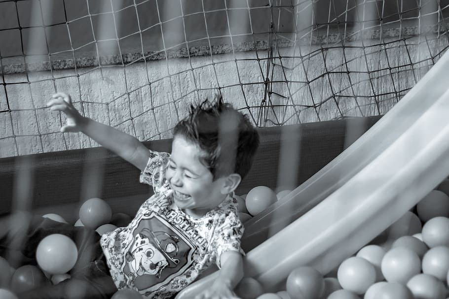 grayscale photography of playing boy, kids, toy, fun, childrem, HD wallpaper