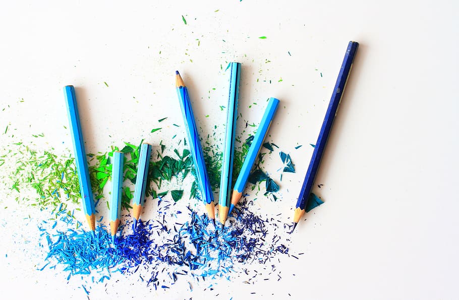 blue flower beside blue color pencil by Zeynep Albayrak. Photo stock -  StudioNow