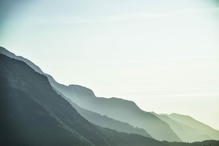 mountains with mist under clear sky, mountains with trees, fog HD wallpaper