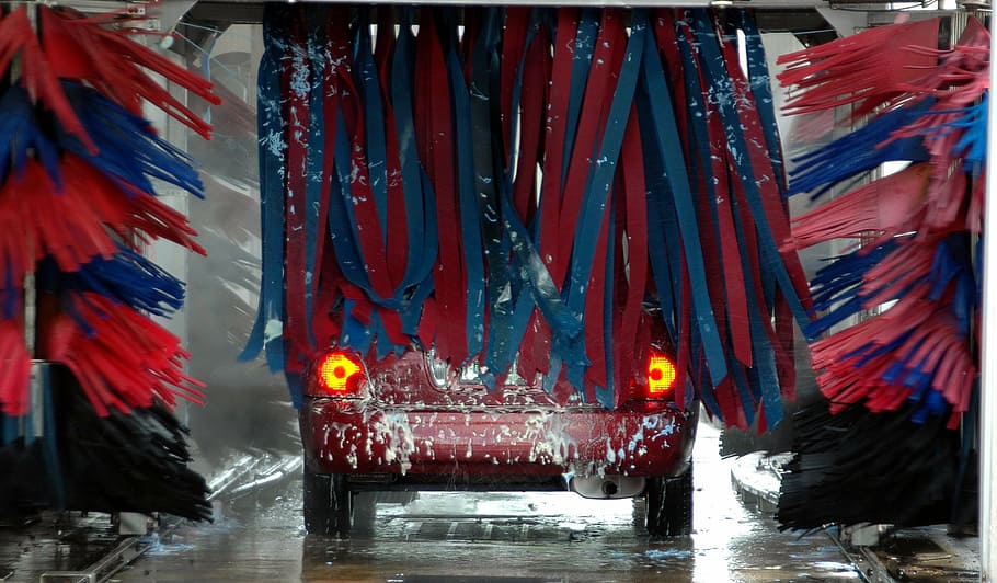 selective focus photography of red vehicle, car wash, motion, HD wallpaper