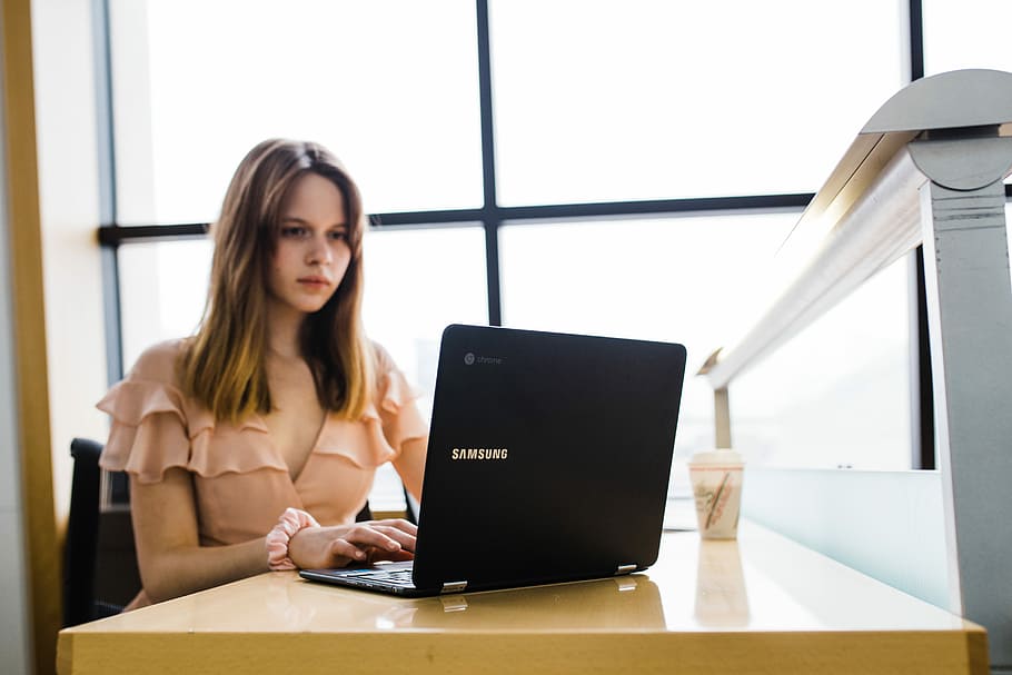 Sponsored by Google Chromebooks, woman sitting while typing on laptop, HD wallpaper