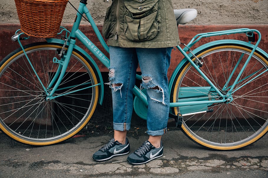 person wearing blue denim jeans standing near blue bicycle, bike, HD wallpaper