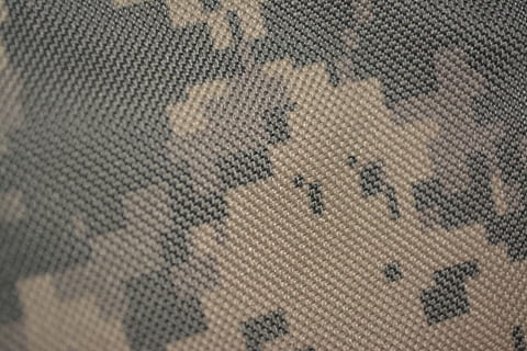 close up photo of gray and brown camouflage knitted textile HD wallpaper