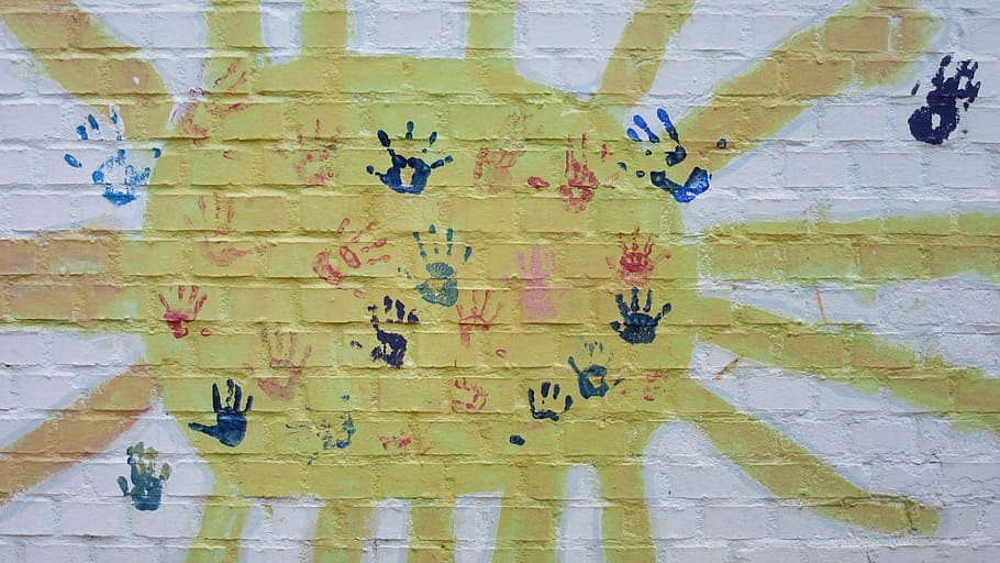 assorted-color of hand prints printed on wall, sun, hands, children's hands HD wallpaper