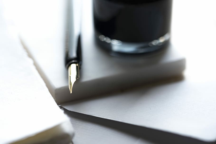 fountain pen beside the glass, black fountain pen beside clear glass HD wallpaper