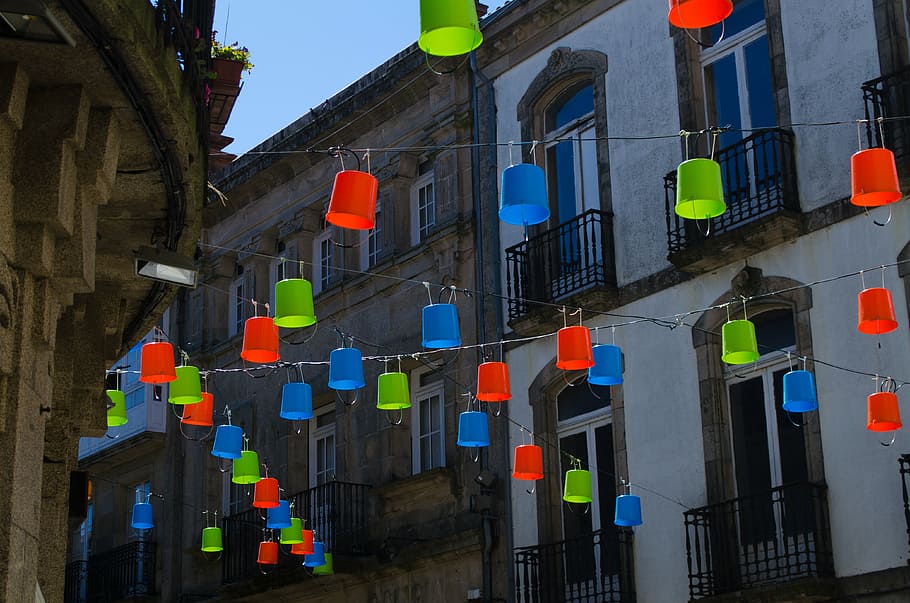 assorted-color hanging decors on street, santiago, cube, installation HD wallpaper