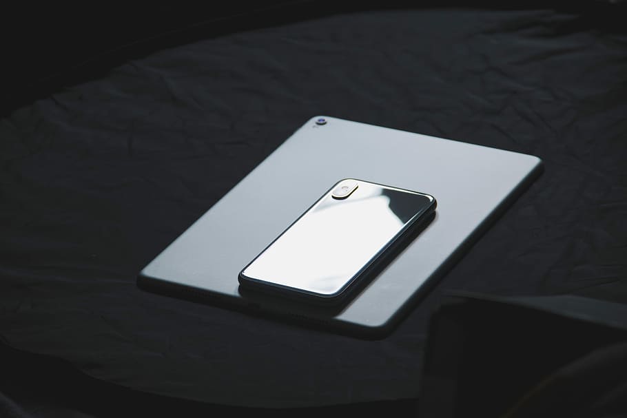 space gray iPhone X on tablet computer, space gray iPhone X on white iPad HD wallpaper
