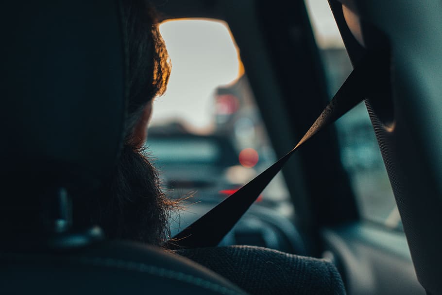 shallow focus photography of person's shoulder, car, passenger HD wallpaper