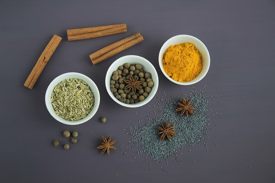 assorted spices on white bowls, seasoning, food, seeds, star anise